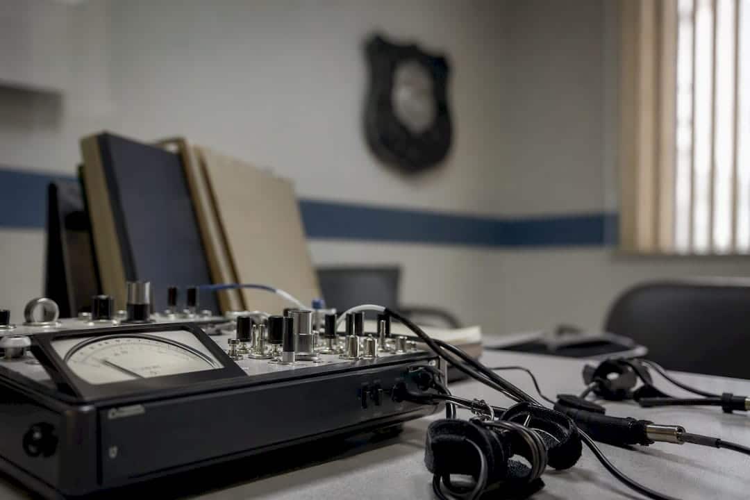 Polygraph device and cables on police screening desk